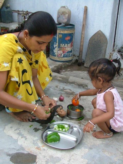 mum & daughter preparing a meal