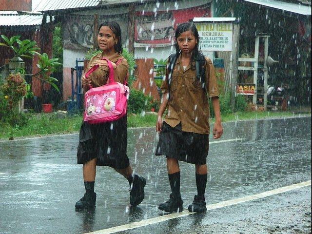 schoolgirls in the rain