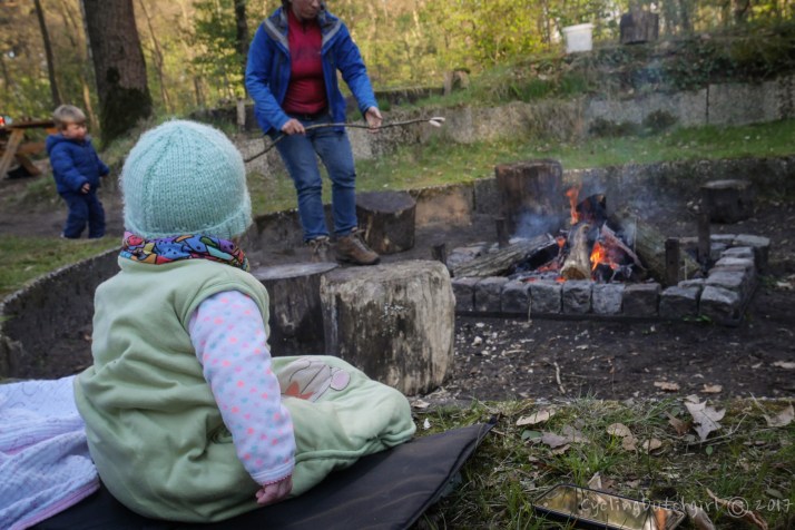 baby at the fire place